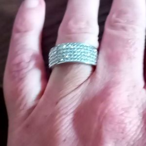 Sterling silver ring embedded with white sapphire